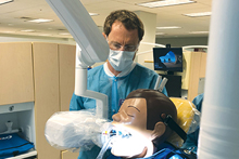 Ben Horn performs simulated dental work