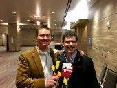Photo of Alumni with Maryland tooth at ADA reception
