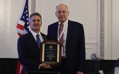 Norman Tinanoff, DDS ’71, MS, recipient of the 2019 American Academy of Pediatric Dentistry’s Merle C. Hunter Leadership Award (right) and Joseph Castellano, DDS, AAPD president 