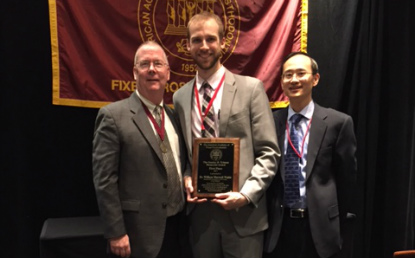 William Wahle, Prosthodontics resident, with Carl Driscoll, DMD, and Dr. Fei Liu of the American Academy of Fixed Prosthodontics.