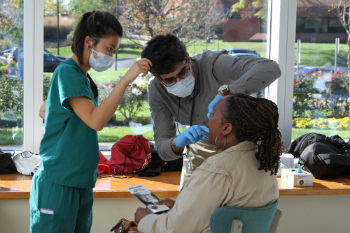 Students screening attendees at Coppin State Event