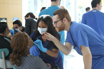 Students screening attendees at Coppin State Event