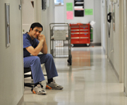 Student sitting in the hallway of the dental clinic