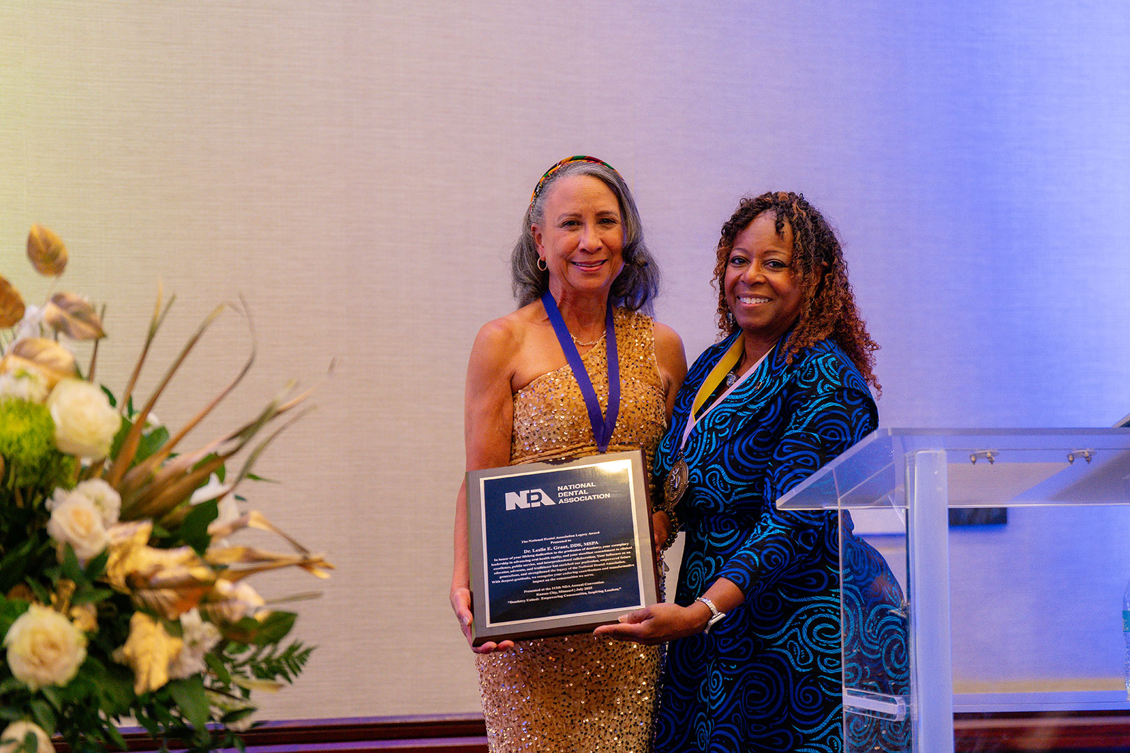 Lelsie Grant receiving the Legacy Award