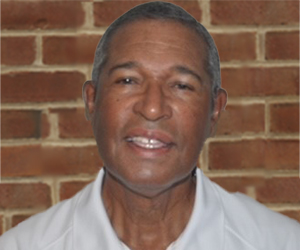 Headshot of Dean's Faculty George Whitaker