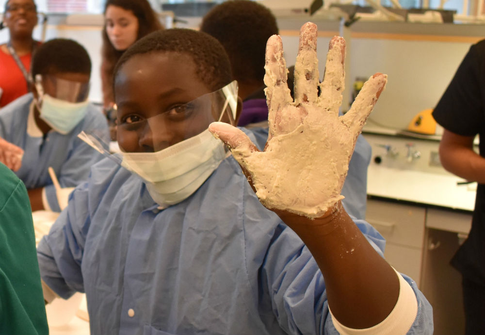 A student participates in the CURE Scholars program