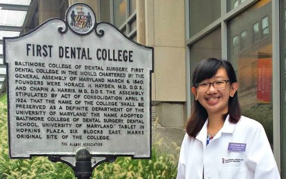 Katherine Ong, DDS ’20 in front of the University of Maryland School of Dentistry