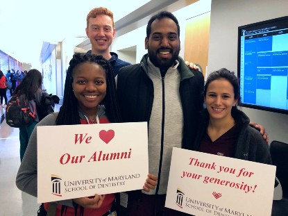 Four DDS students at UMSOD