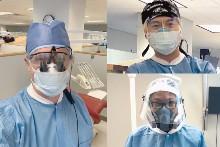 Three dental students in personal protective equipment (PPE)