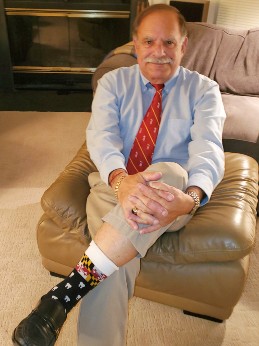 A man wearing colorful socks