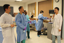 Picture of LaShonda Shepherd, Ben Horne, and Dan Yang at Gross Anatomy lecture