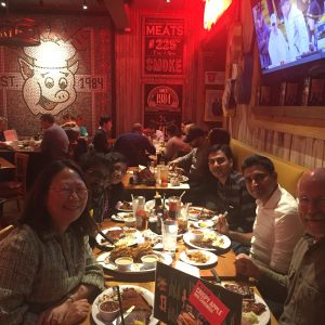 Lab members having dinner in a restaurant