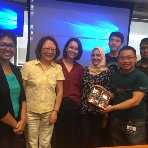 Dr. Lowe and students at a mooncake festival