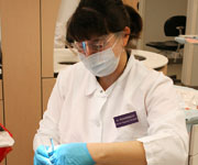 A dental assistant providing care