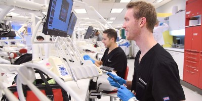 Dental students working in the simulation lab