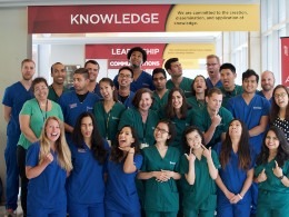 A group of students offering congratulations