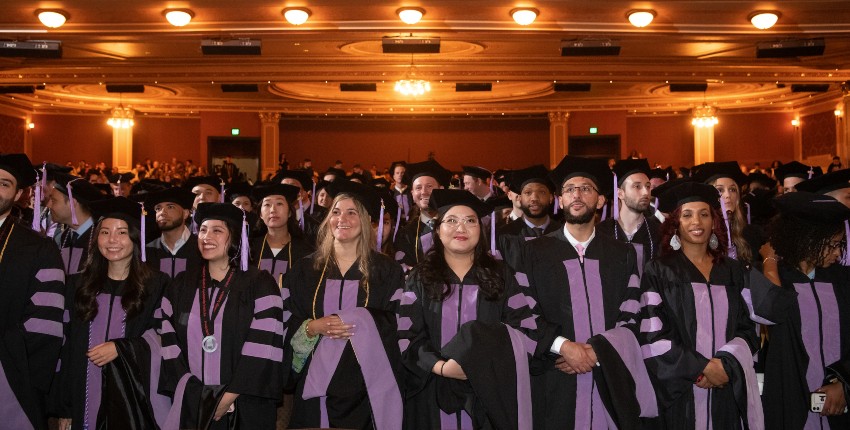 Dental graduates gather in cap and gown for the 2023 Honors Convocation.